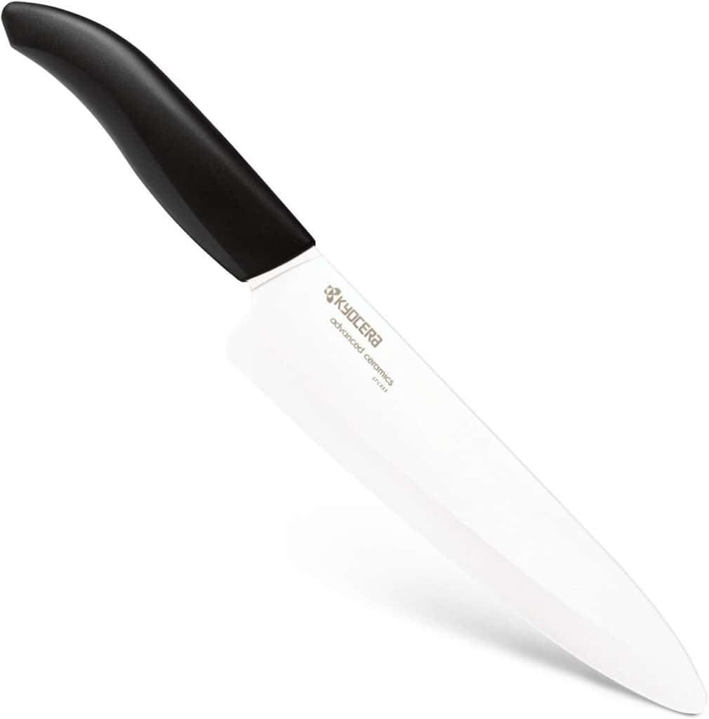 A Kyocera 7-inch ceramic chef's knife with a black handle and white blade.